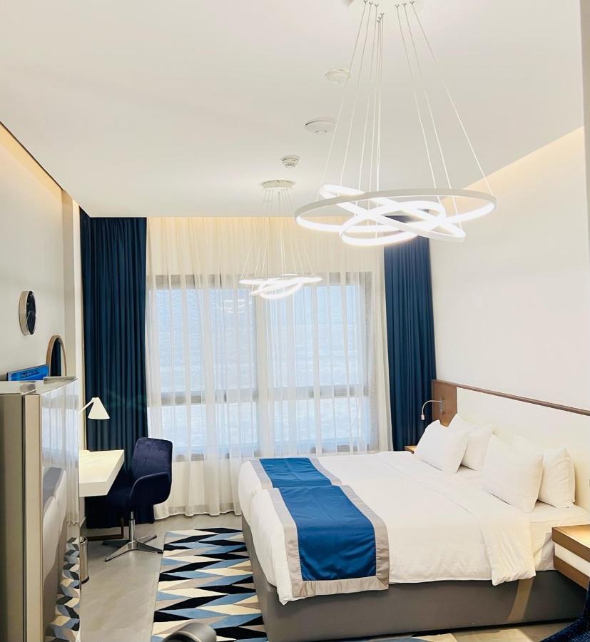 Abar Hotel Apartments Dip-1 Dubai Esterno foto